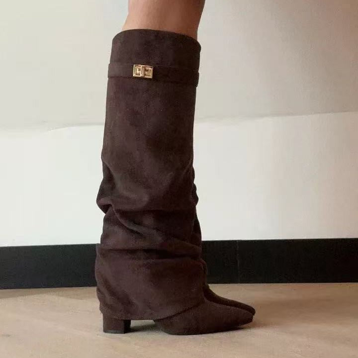 Women's pointed-toe statement boots