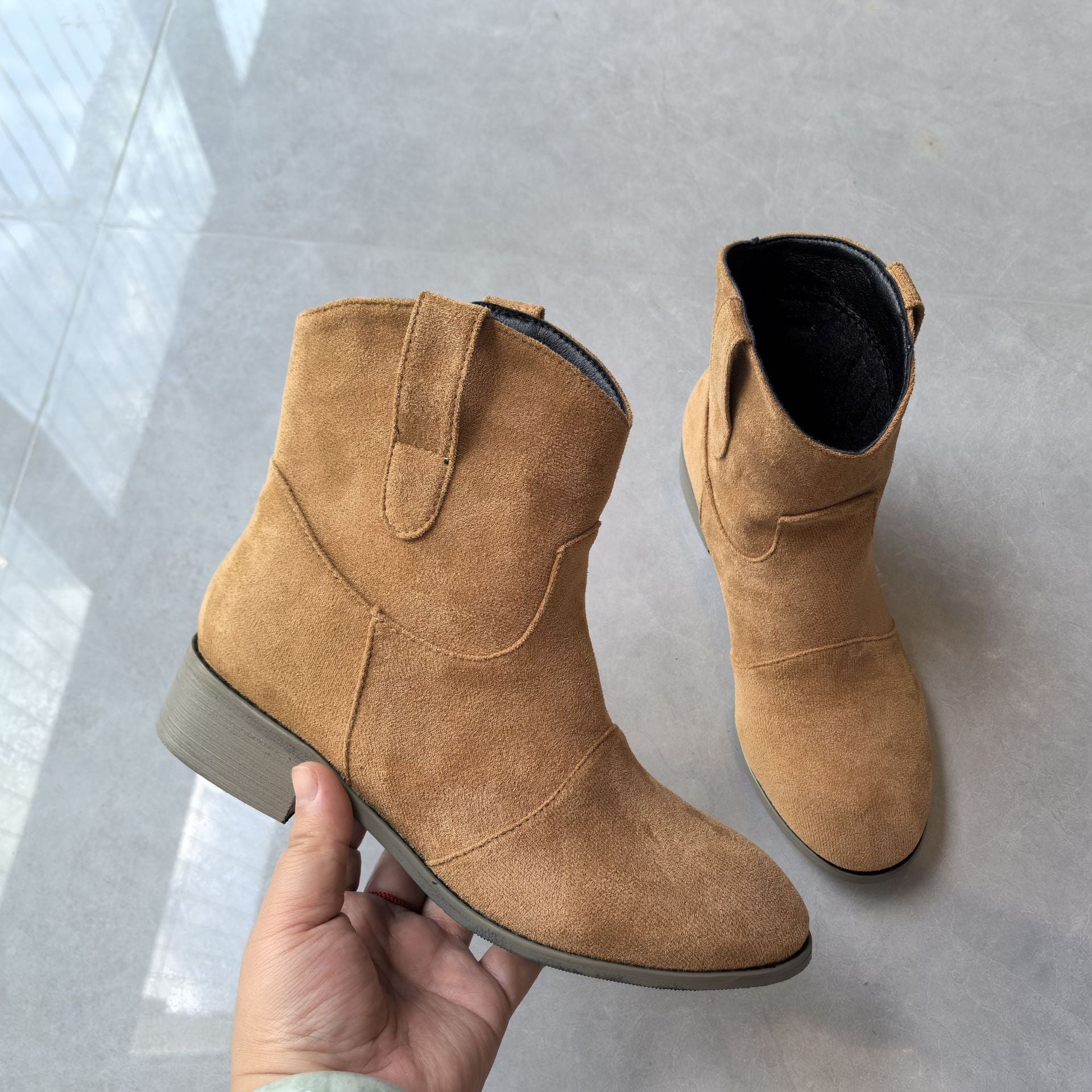 Women's low-heel suede boots side view